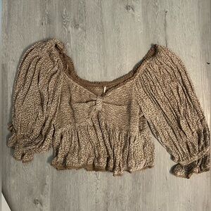 Free People Brown Blouse with Elegant Design